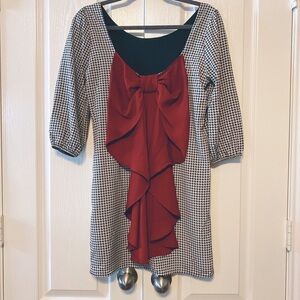 Lila Houndstooth Puff Sleeve with bow in the Back